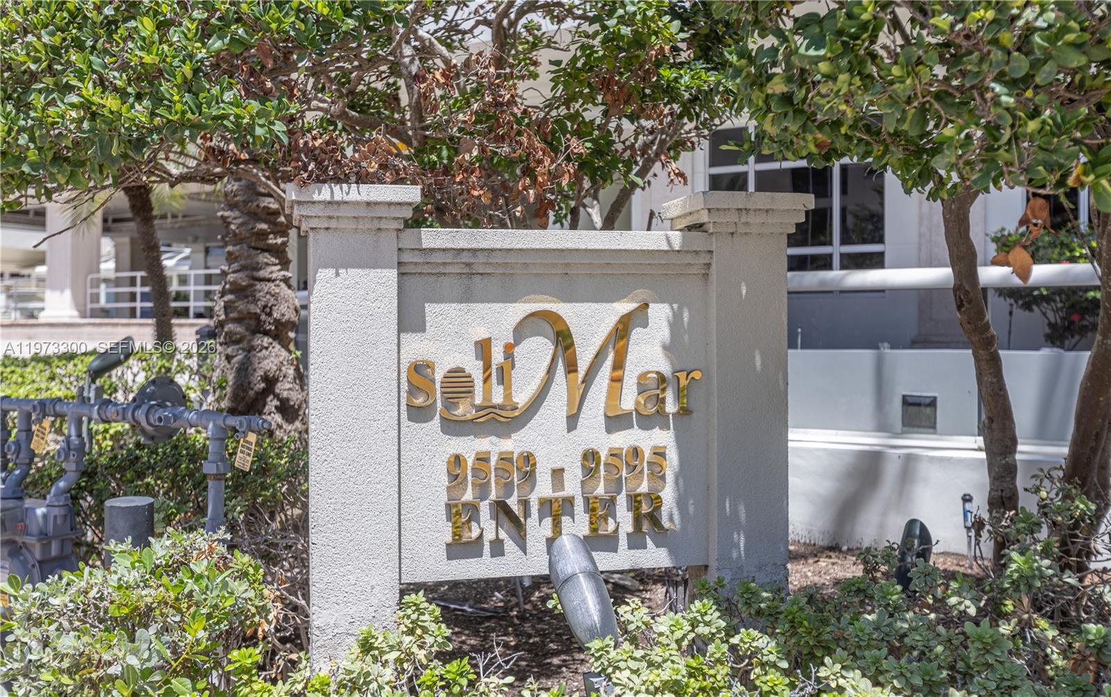 9559 Collins Avenue, Unit S7D Surfside, FL 33154 - Photo 2 of 59 a sign that is on the side of a building