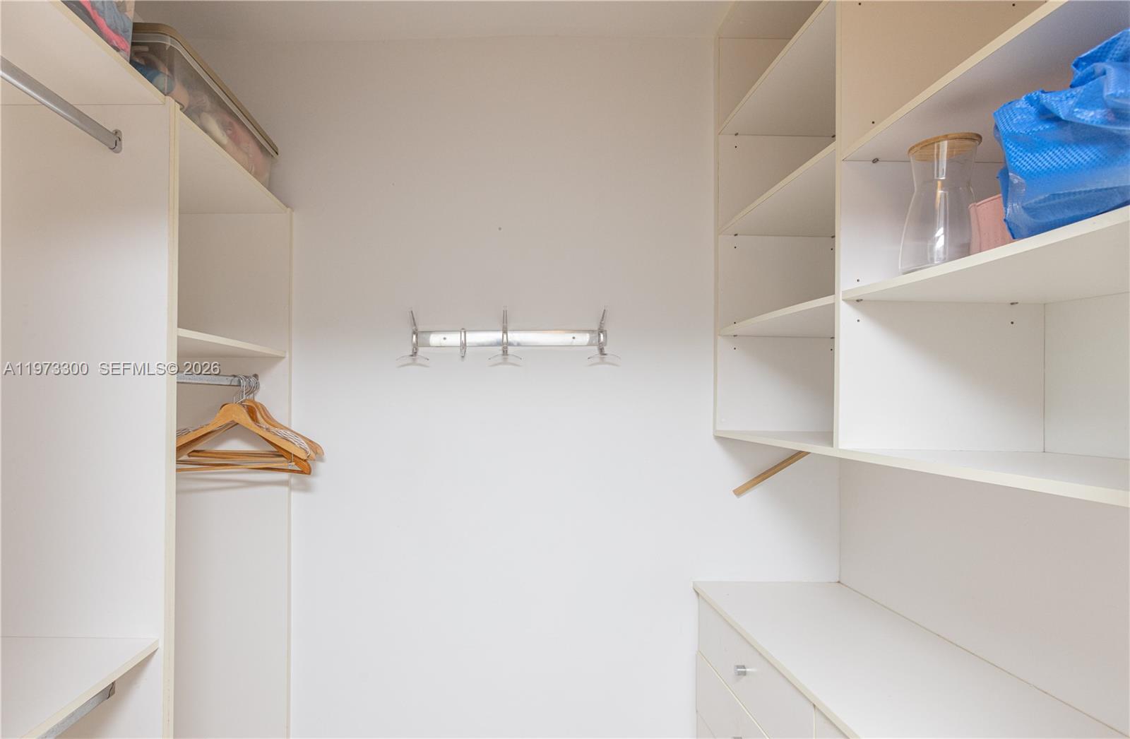 9559 Collins Avenue, Unit S7D Surfside, FL 33154 - Photo 26 of 59 a view of small space with racks on the wall