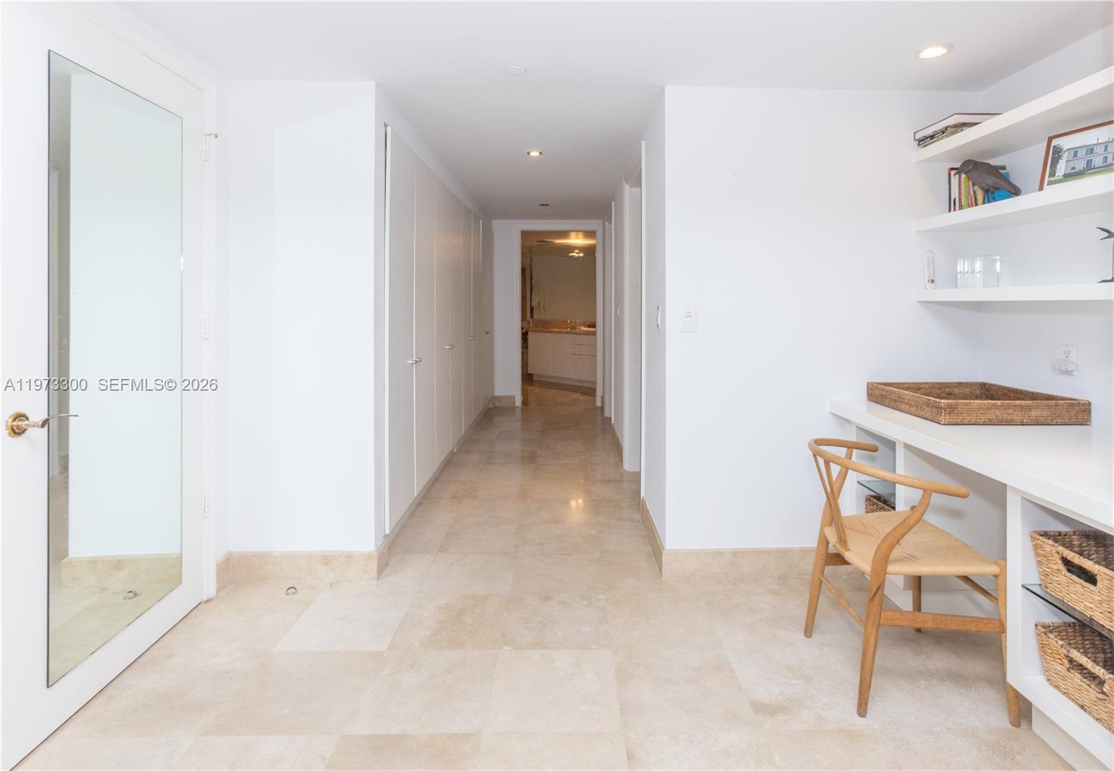 9559 Collins Avenue, Unit S7D Surfside, FL 33154 - Photo 29 of 59 a view of a hallway with seating area