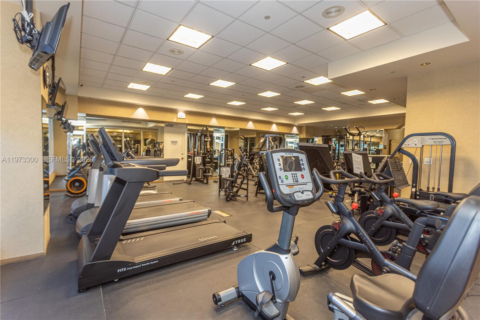 9559 Collins Avenue, Unit S7D Surfside, FL 33154 - Photo 56 of 59 a view of a room with gym equipment