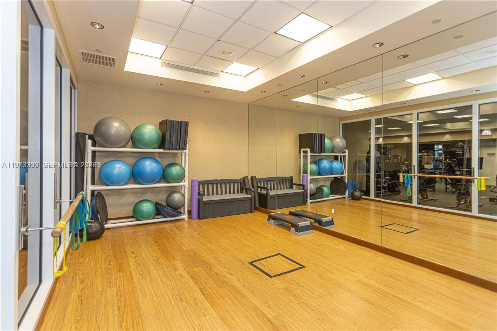 9559 Collins Avenue, Unit S7D Surfside, FL 33154 - Photo 58 of 59 a view of a room with gym equipment