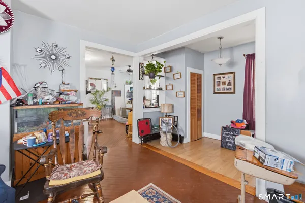 a view of a room with workspace and toys