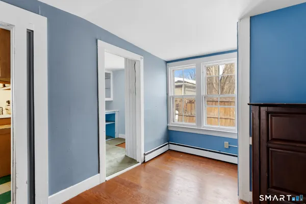 a view of an empty room and window