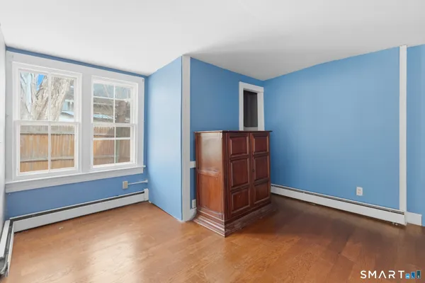 an empty room with windows