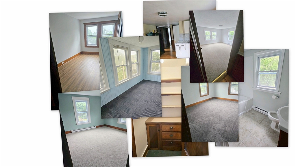 a view of living room with furniture and a painting