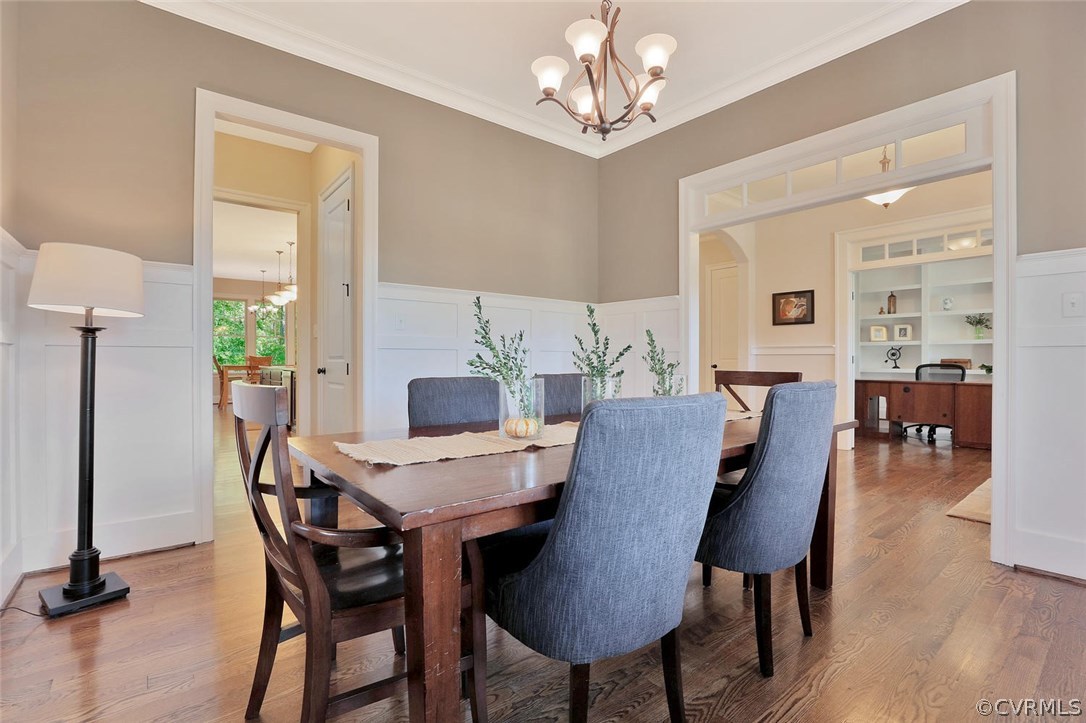 16106 Alsdell Road Midlothian, VA 23112 - Photo 13 of 46 a view of a dining room with furniture window and wooden floor