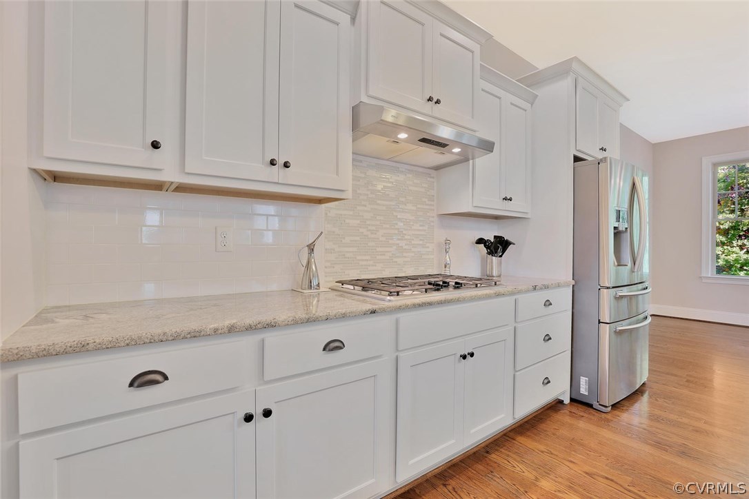 16106 Alsdell Road Midlothian, VA 23112 - Photo 15 of 46 a kitchen with granite countertop white cabinets and white appliances