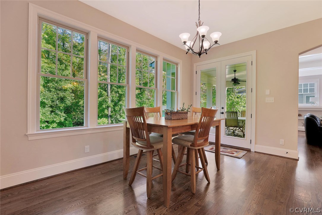 16106 Alsdell Road Midlothian, VA 23112 - Photo 17 of 46 a view of a dining room with furniture window and wooden floor