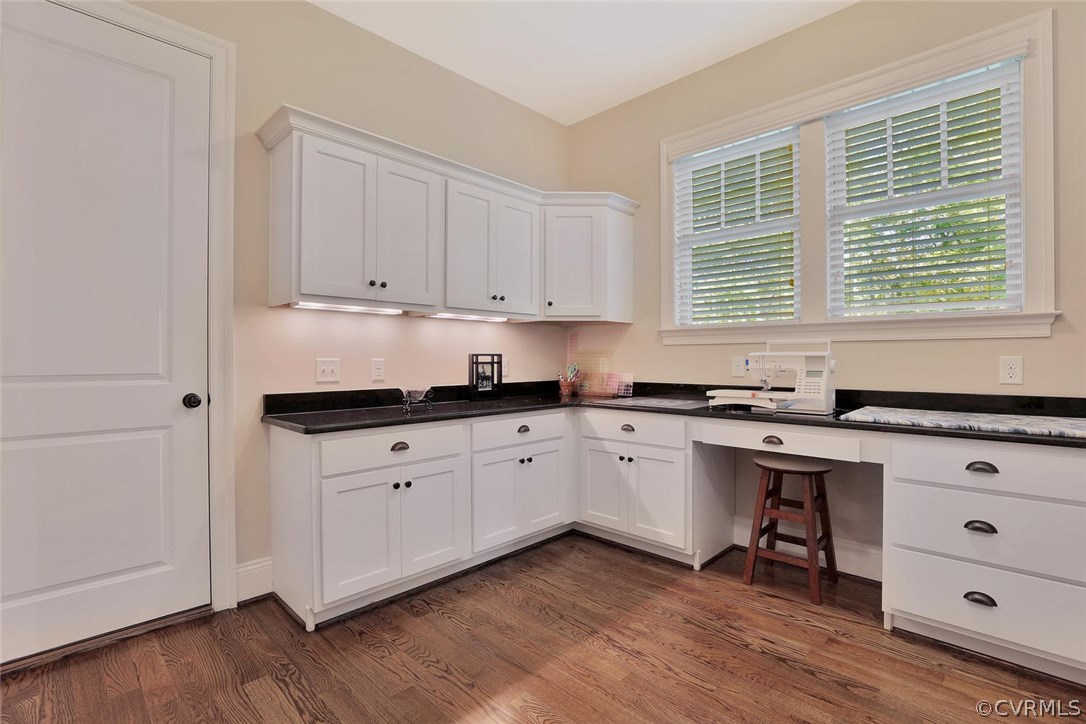 16106 Alsdell Road Midlothian, VA 23112 - Photo 18 of 46 a kitchen with granite countertop white cabinets window and stainless steel appliances