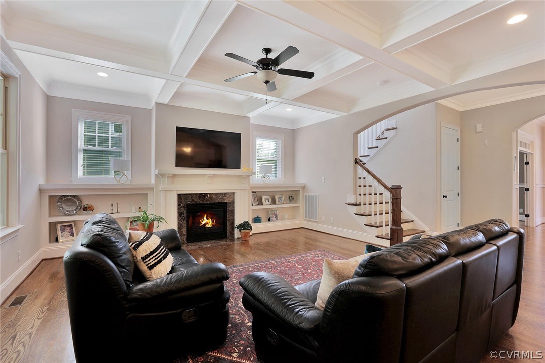 16106 Alsdell Road Midlothian, VA 23112 - Photo 2 of 46 a living room with furniture a fireplace and a flat screen tv