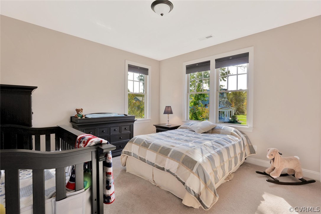 16106 Alsdell Road Midlothian, VA 23112 - Photo 24 of 46 a bedroom with a bed and a window