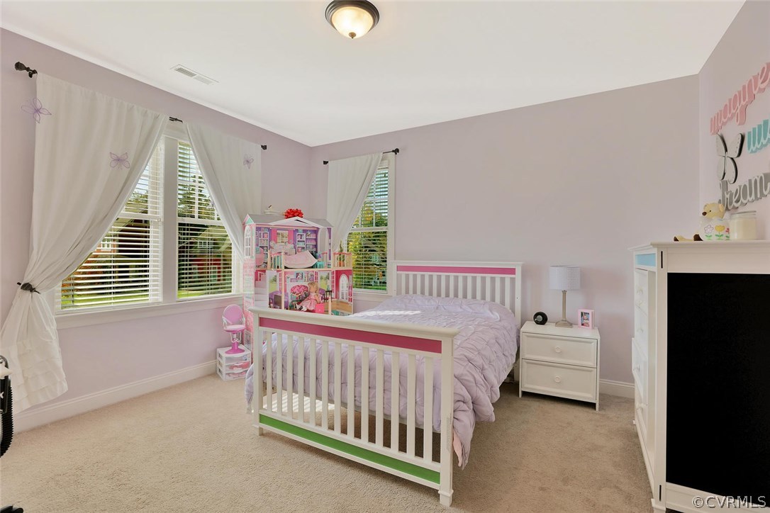 16106 Alsdell Road Midlothian, VA 23112 - Photo 26 of 46 a bedroom with a bed and a window