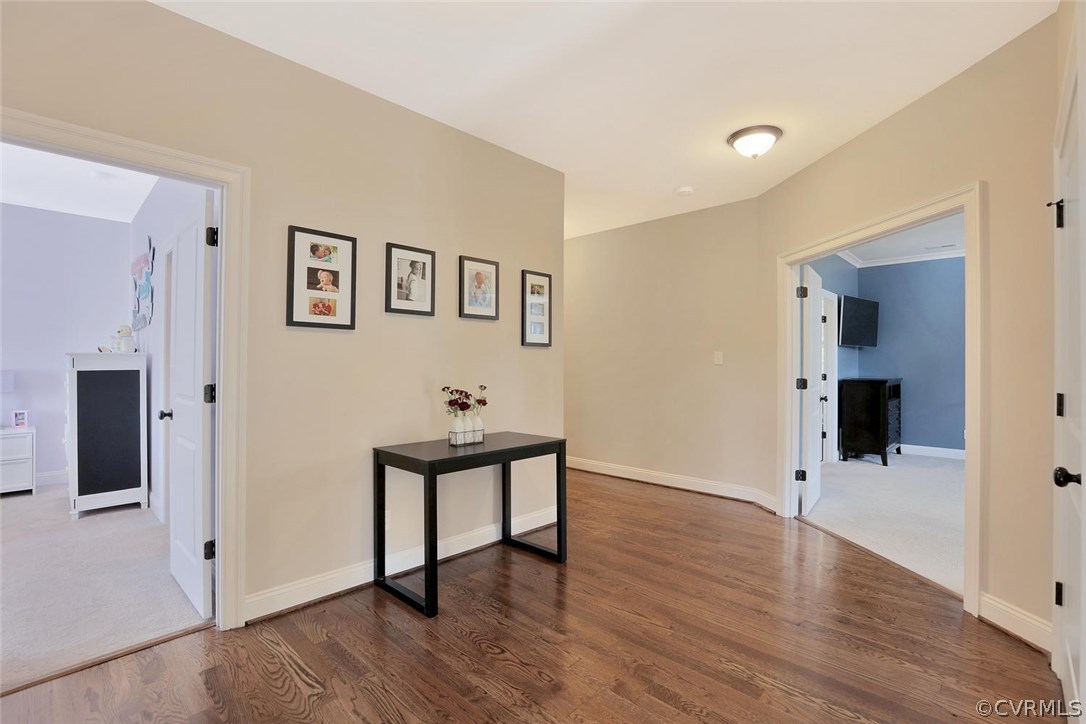 16106 Alsdell Road Midlothian, VA 23112 - Photo 27 of 46 a view of an empty room with wooden floor and a window