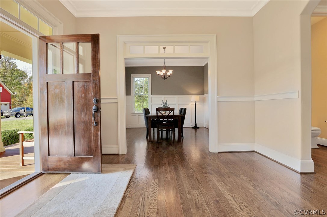 16106 Alsdell Road Midlothian, VA 23112 - Photo 8 of 46 a view of a livingroom with furniture and wooden floor