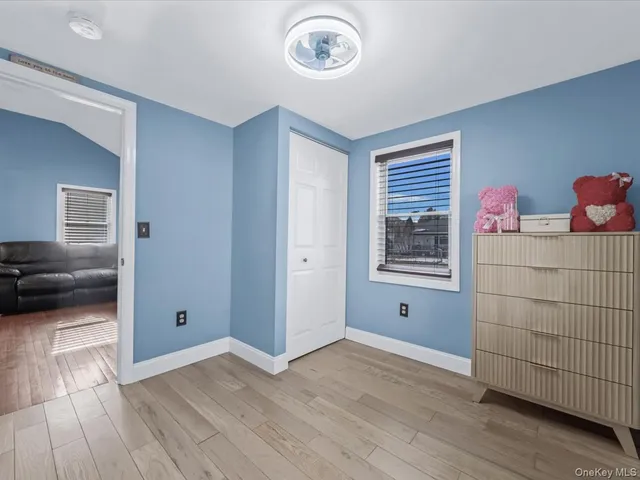 a view of a livingroom with wooden floor