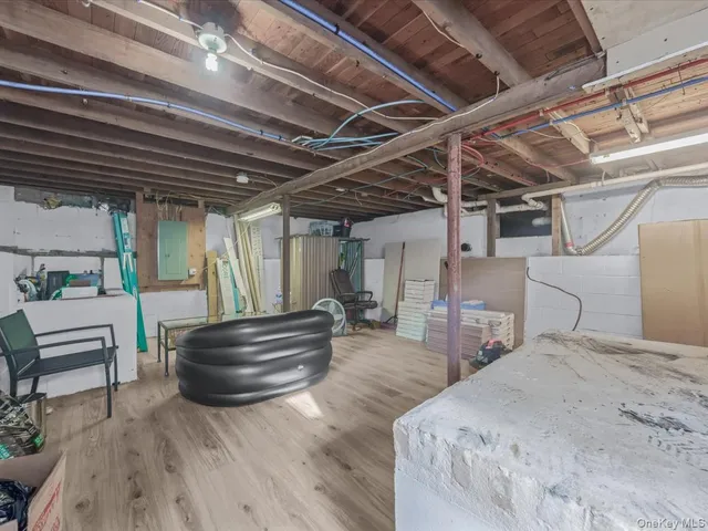 a bedroom with furniture and a roof