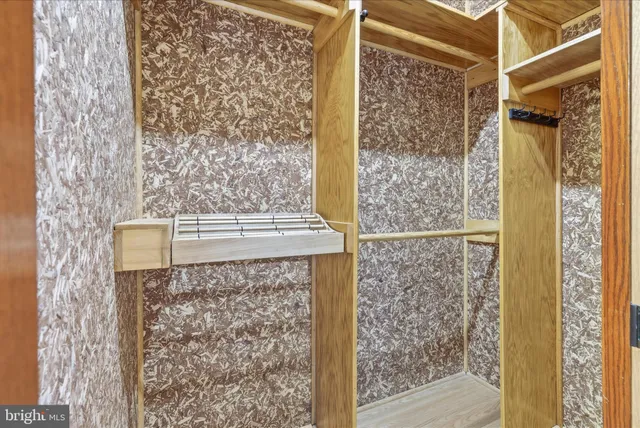 a bathroom with a shower and a sink