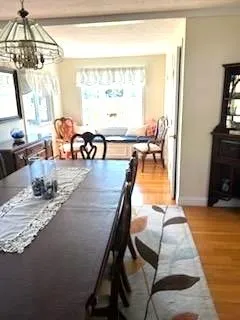a view of a living room and dining room