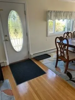 a view of a livingroom with furniture and window