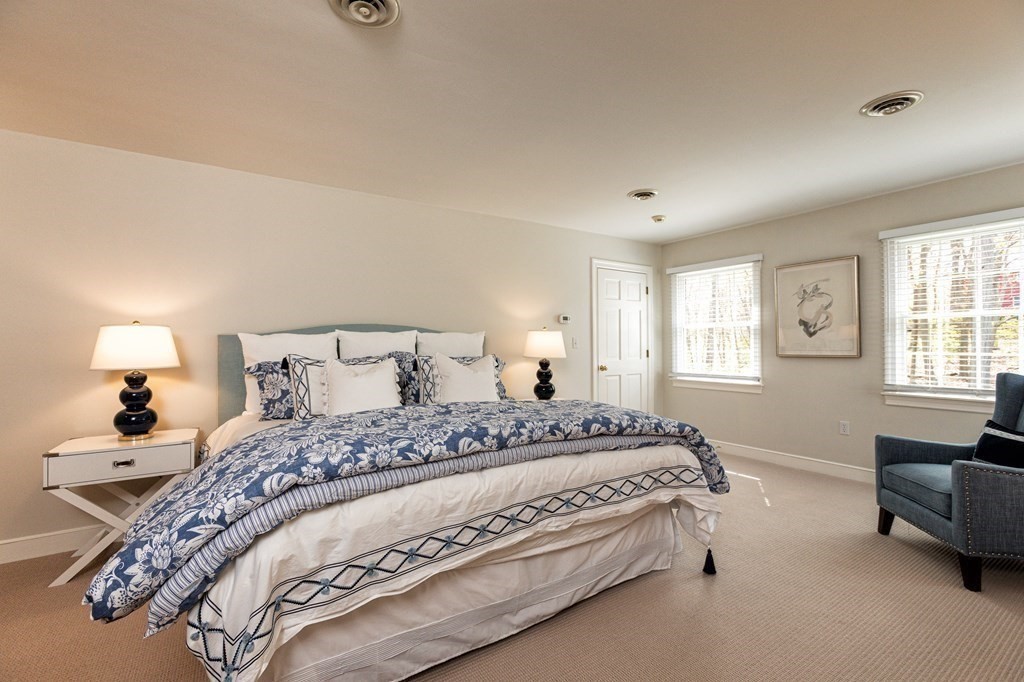 44 Eaton Road Lexington, MA 02420 - Photo 13 of 24 a bedroom with a bed and a couch with window