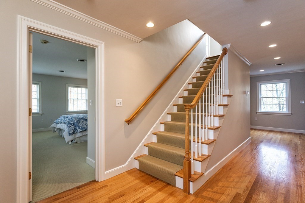 44 Eaton Road Lexington, MA 02420 - Photo 20 of 24 a view of entryway and hall with wooden floor