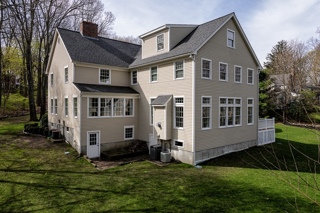 44 Eaton Road Lexington, MA 02420 - Photo 24 of 24 a front view of a house with a yard