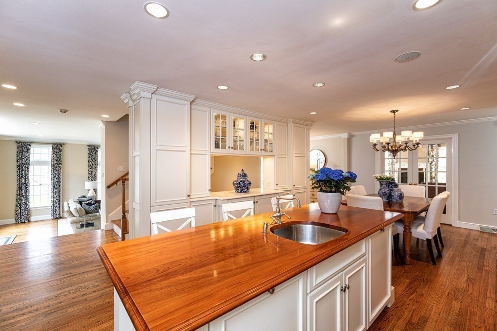 44 Eaton Road Lexington, MA 02420 - Photo 6 of 24 a kitchen with lots of counter top space and living room