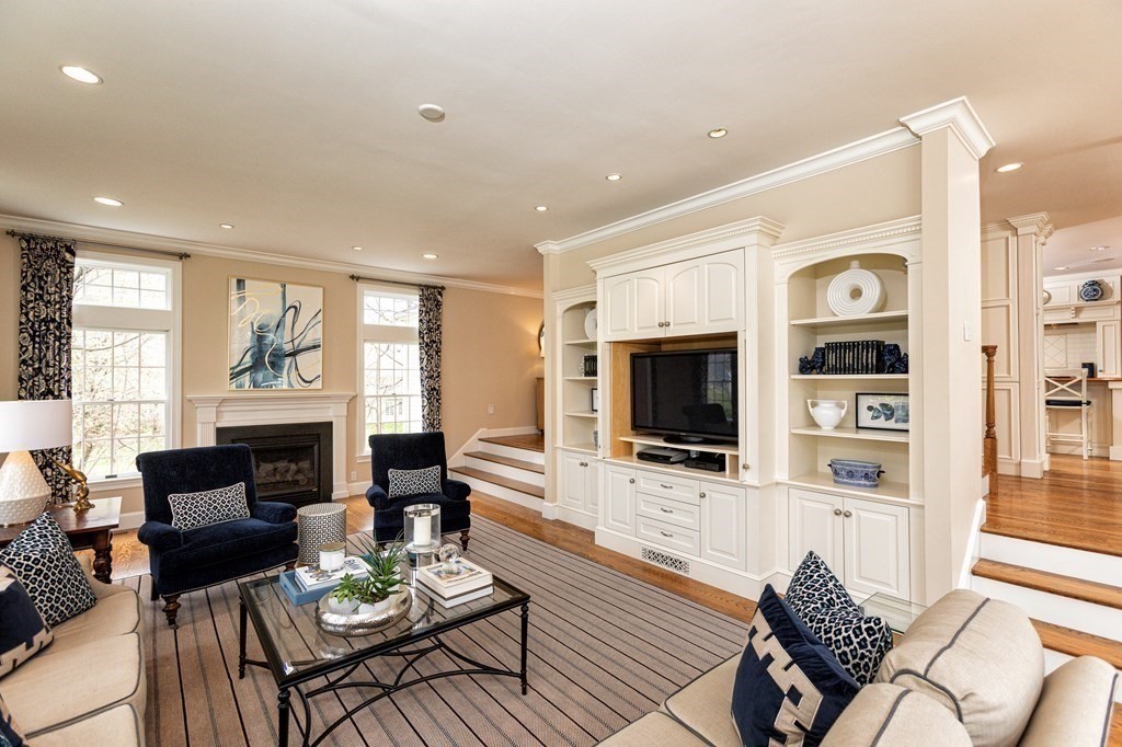 44 Eaton Road Lexington, MA 02420 - Photo 7 of 24 a living room with furniture flat screen tv and a large window