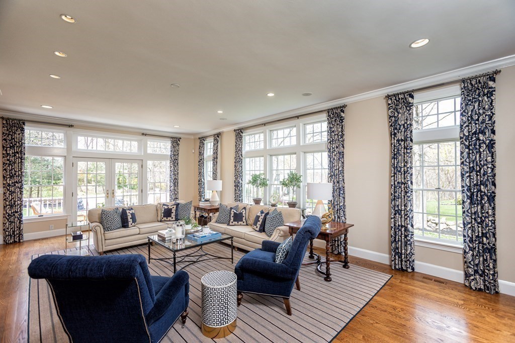 44 Eaton Road Lexington, MA 02420 - Photo 8 of 24 a living room with furniture and large windows