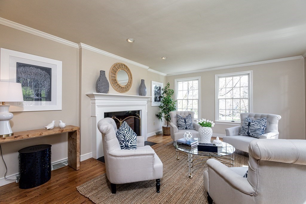 44 Eaton Road Lexington, MA 02420 - Photo 10 of 24 a living room with furniture and a fireplace