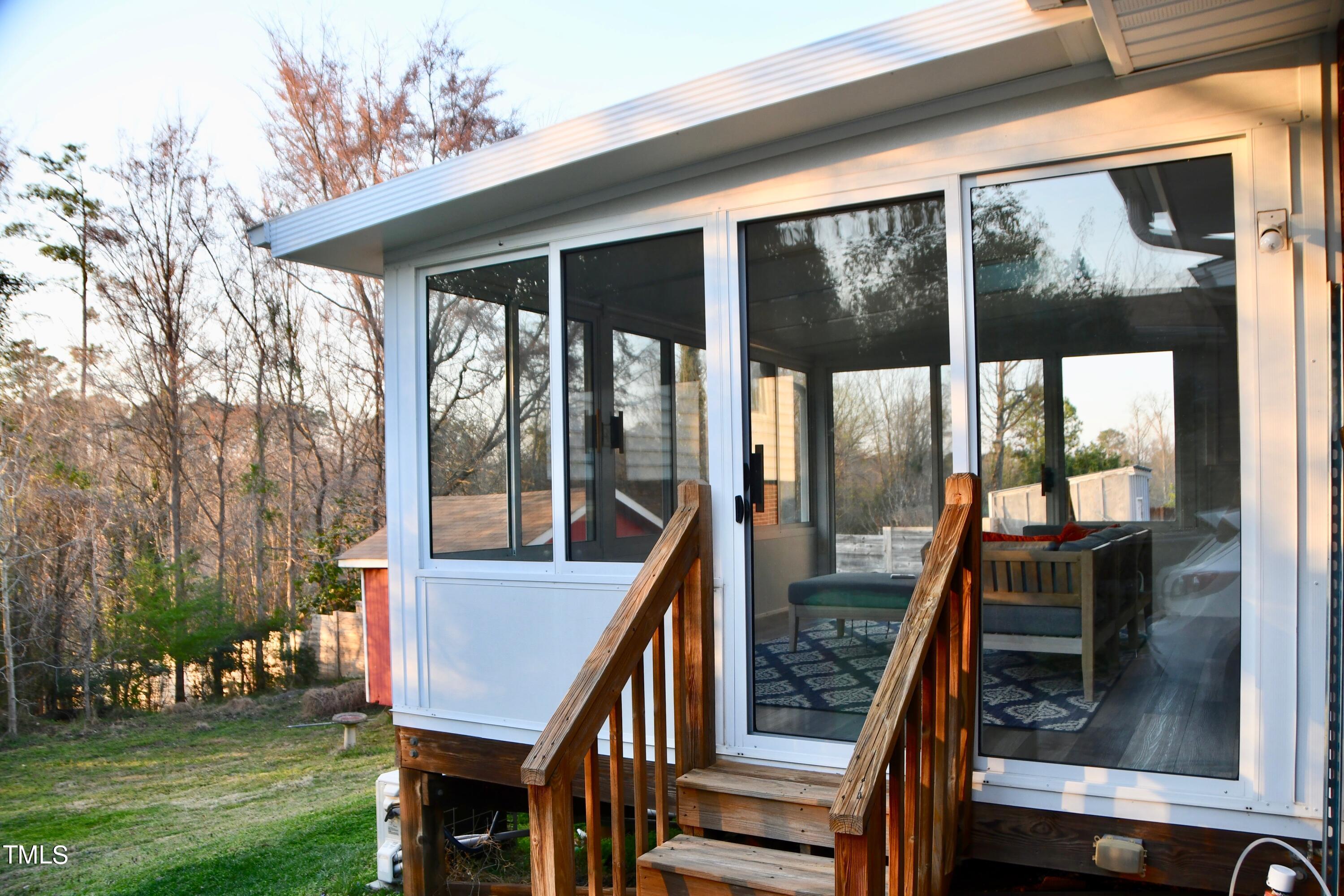1401 North King Charles Road Raleigh, NC 27610 - Photo 20 of 21 View of exterior of sunroom.