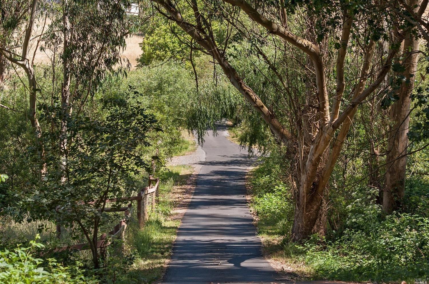 5669 Roblar Road Petaluma, CA 94952 - Photo 1 of 1 Welcome to 5669 Roblar Road in West Petaluma! Beautifully paved private driveway entrance.