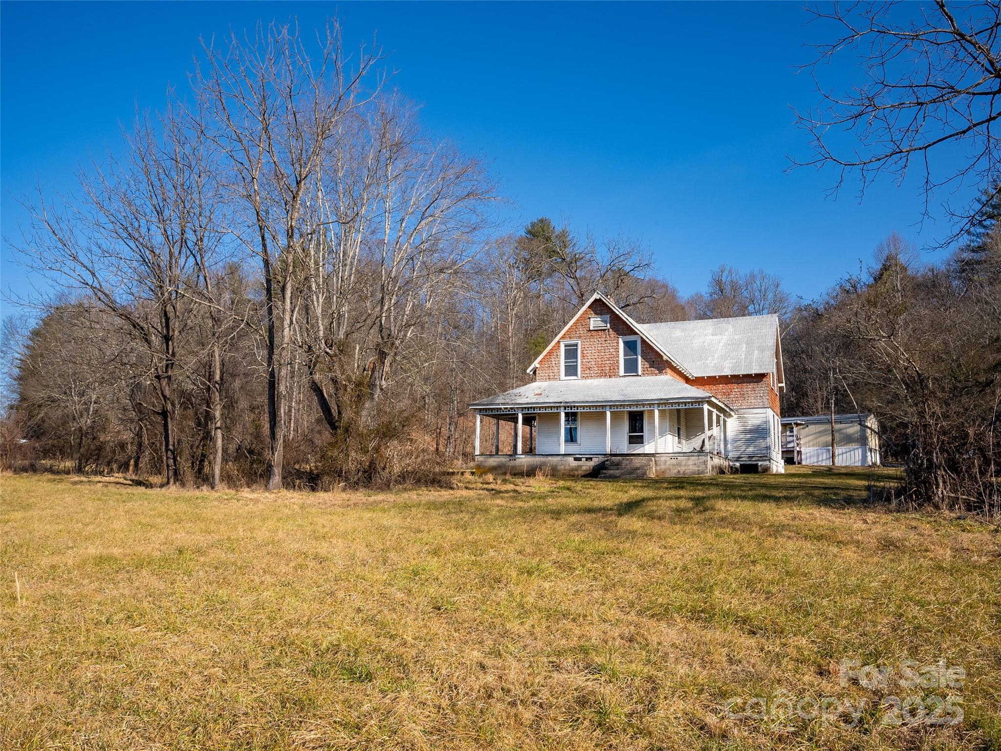 0 Lyons Mountain Road Brevard, NC 28712 - Photo 13 of 15 a front view of a house with a yard