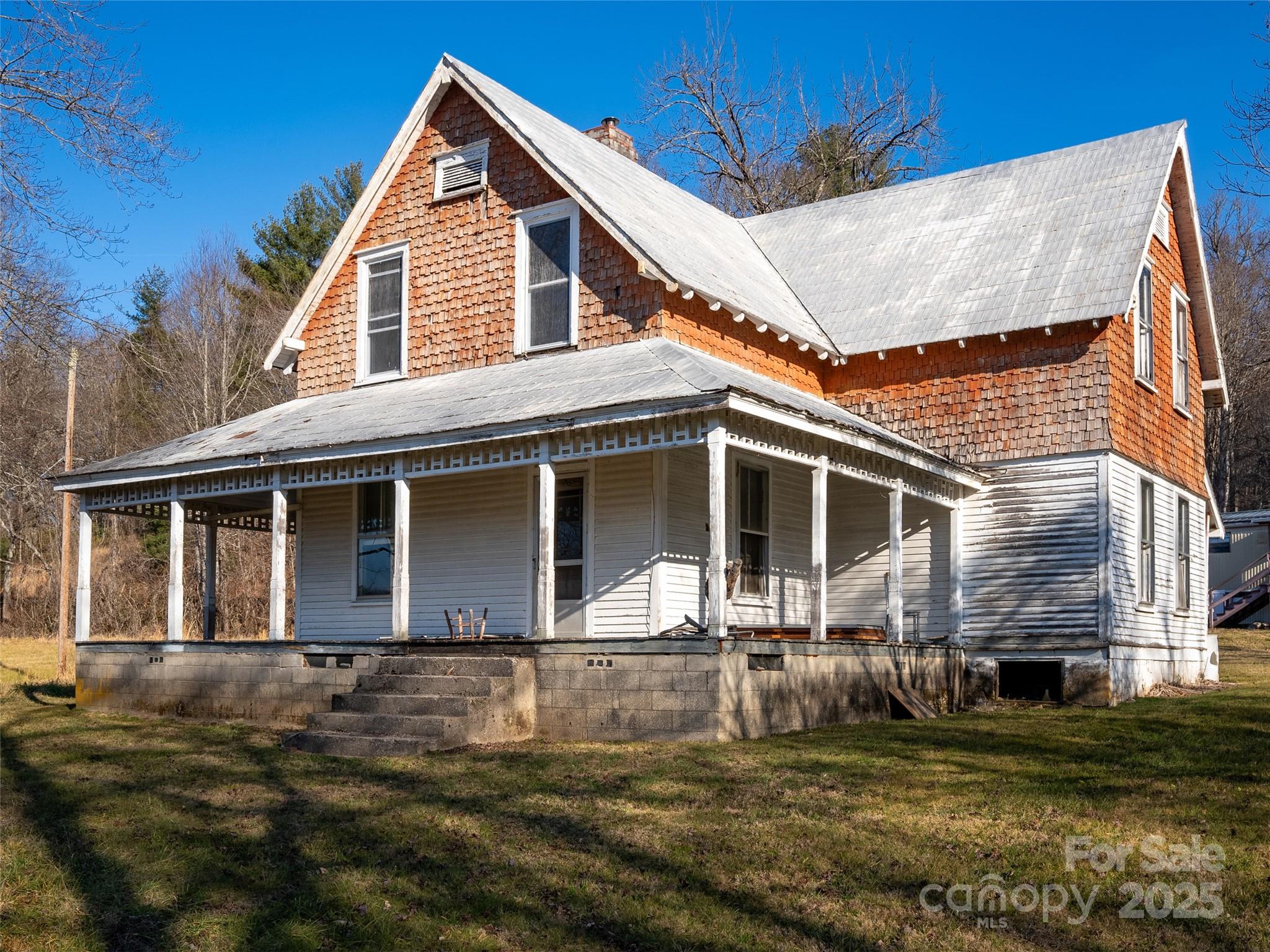 0 Lyons Mountain Road Brevard, NC 28712 - Photo 14 of 15 a front view of a house with a yard