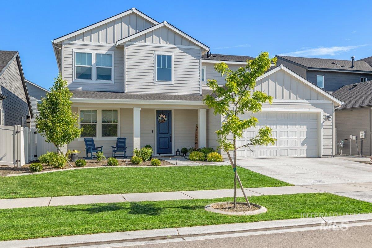 1380 West Chilitna Street Meridian, ID 83642 - Photo 1 of 50 Two-story residence featuring light gray siding with vertical accents