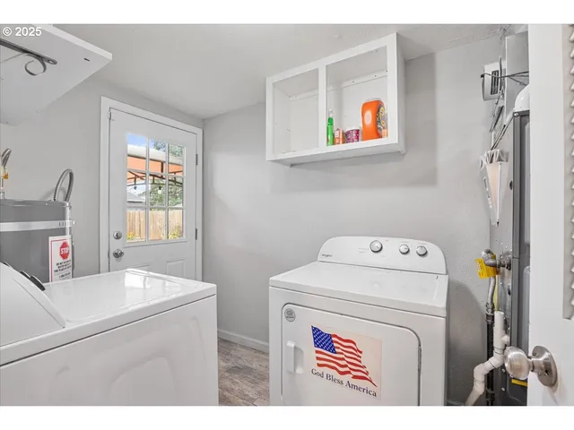 a utility room with dryer and washer