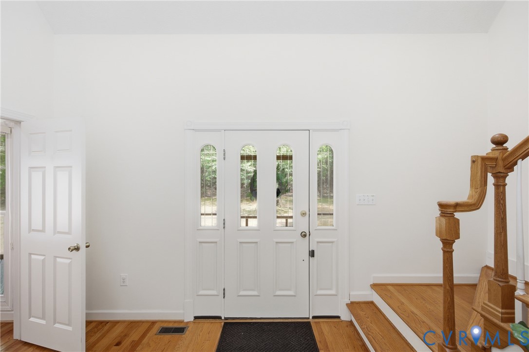 13265 Coulbourn Road Saluda, VA 23149 - Photo 17 of 62 Double entry doors with decorative arched glass pa