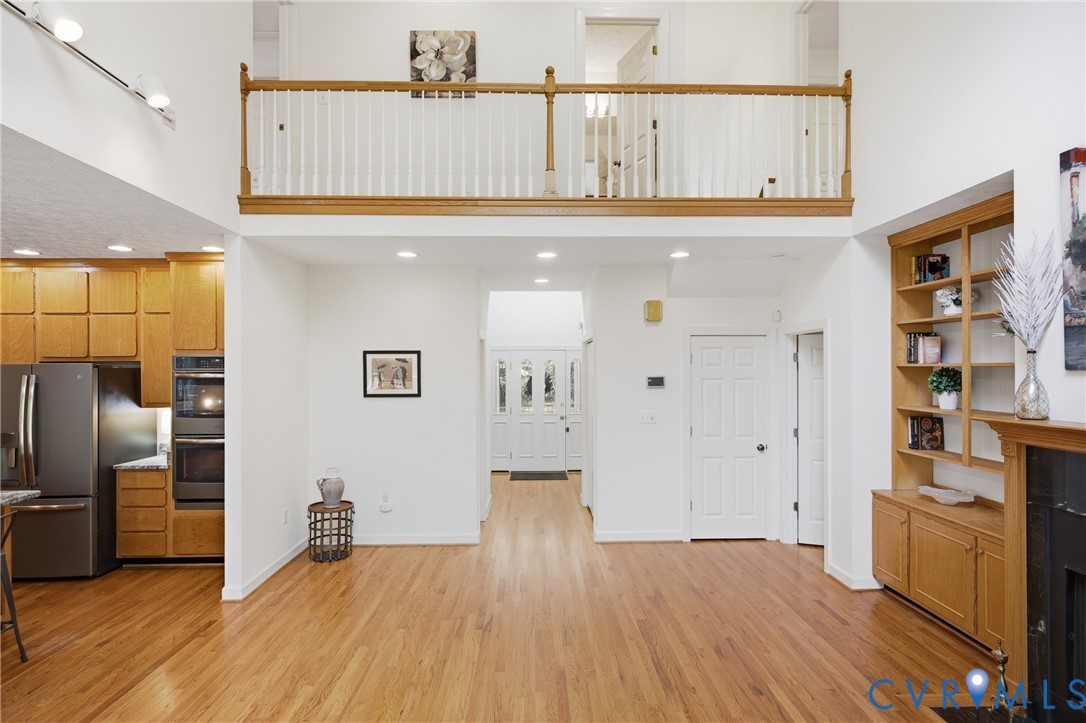 13265 Coulbourn Road Saluda, VA 23149 - Photo 2 of 62 Open-concept living space featuring wood-finish fl