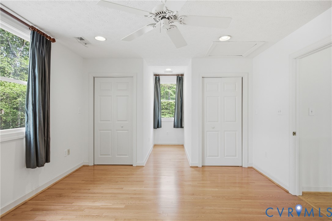 13265 Coulbourn Road Saluda, VA 23149 - Photo 35 of 62 wooden floor in an empty room with a window