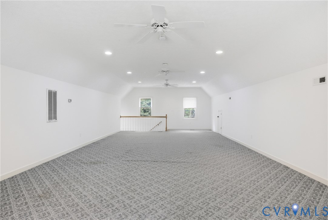 13265 Coulbourn Road Saluda, VA 23149 - Photo 40 of 62 Expansive upstairs room featuring vaulted ceilings