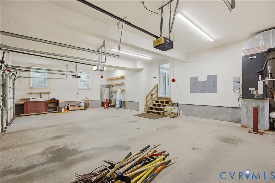 13265 Coulbourn Road Saluda, VA 23149 - Photo 42 of 62 Spacious garage featuring concrete flooring, multi