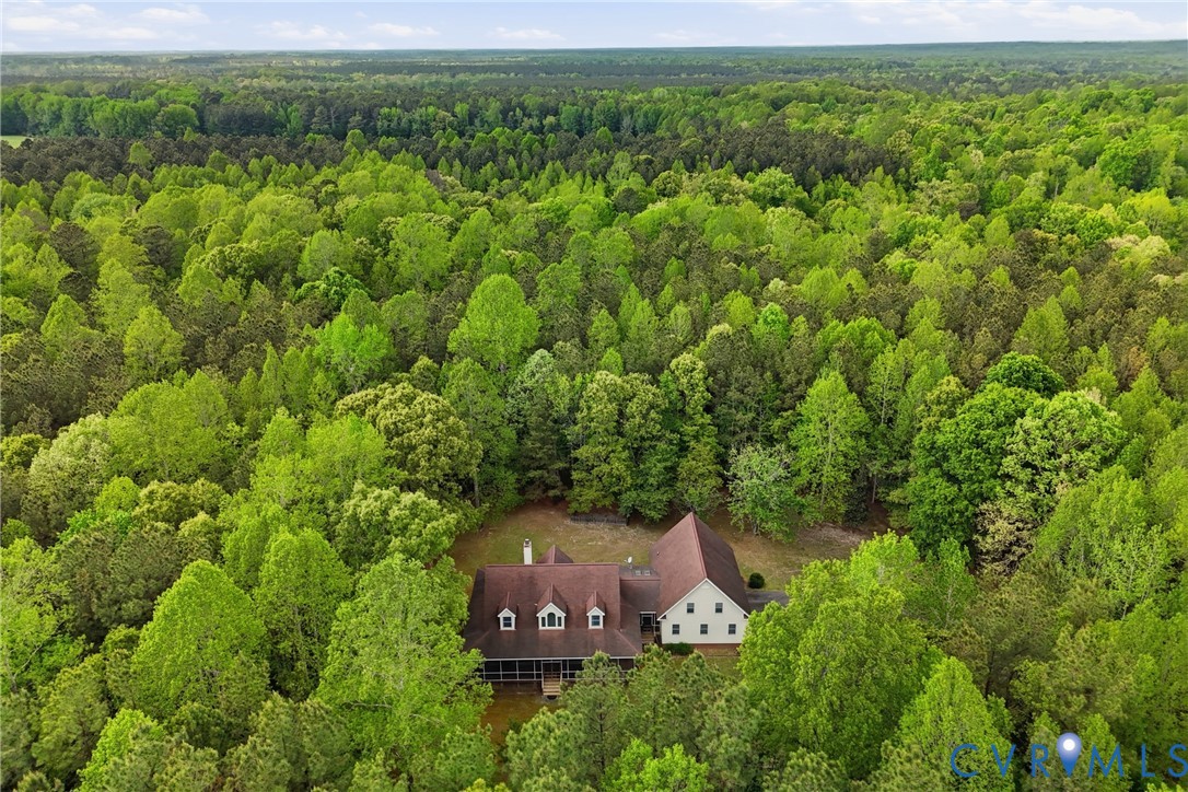 13265 Coulbourn Road Saluda, VA 23149 - Photo 61 of 62 Aerial perspective of a multi-story residence with