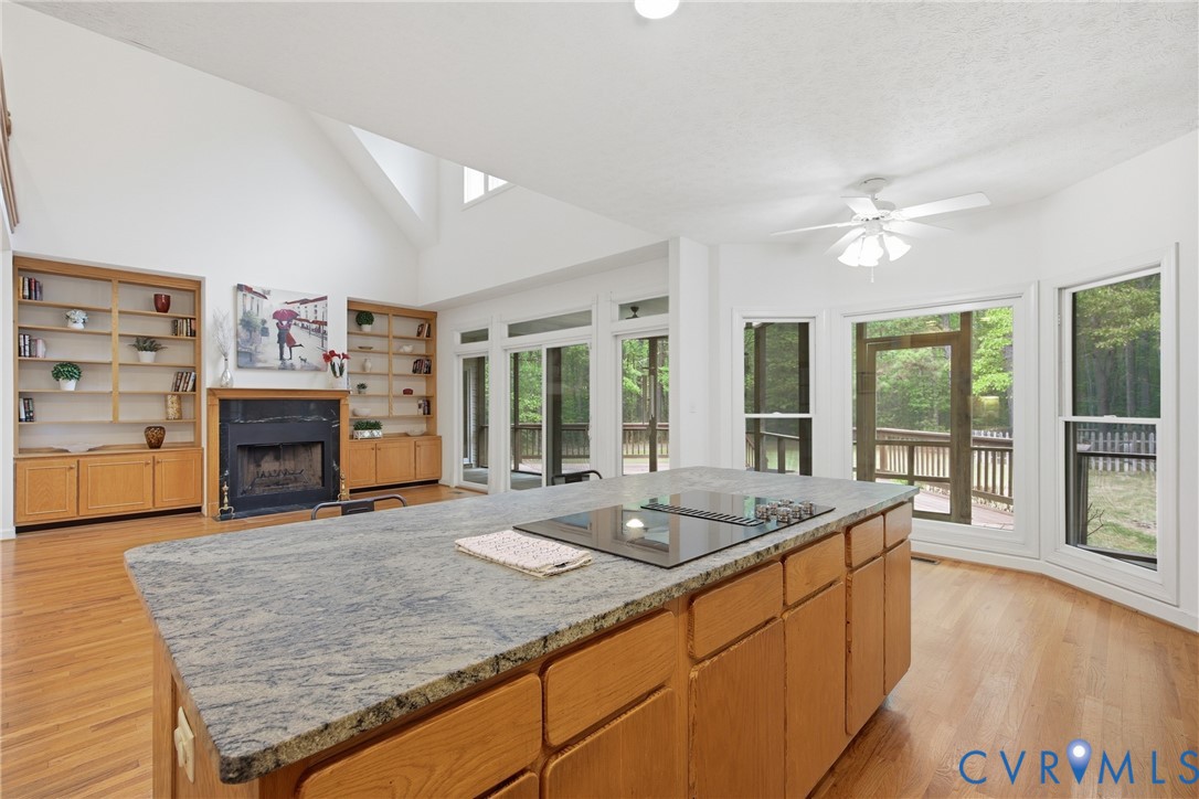 13265 Coulbourn Road Saluda, VA 23149 - Photo 9 of 62 Expansive kitchen island featuring a smooth cookto
