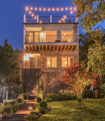 a front view of a building with a swimming pool