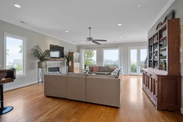 a bathroom with a granite countertop sink a large mirror and a vanity