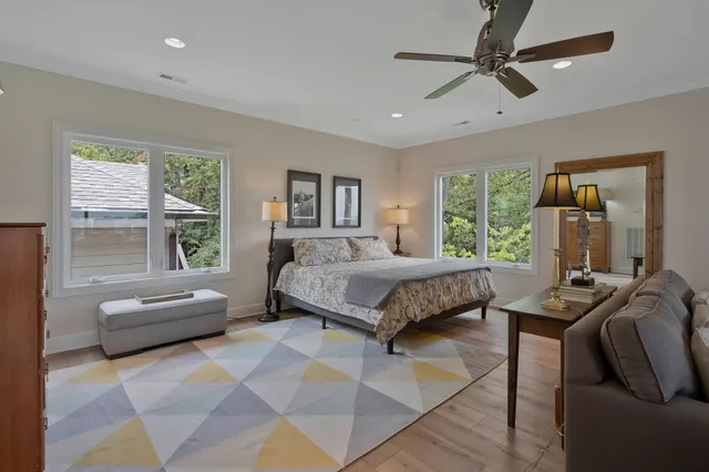 a view of a patio with table and chairs and potted plants