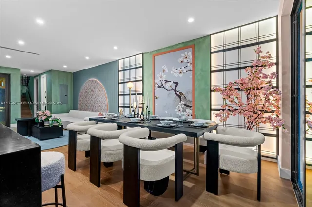 a view of a dining room with furniture and window