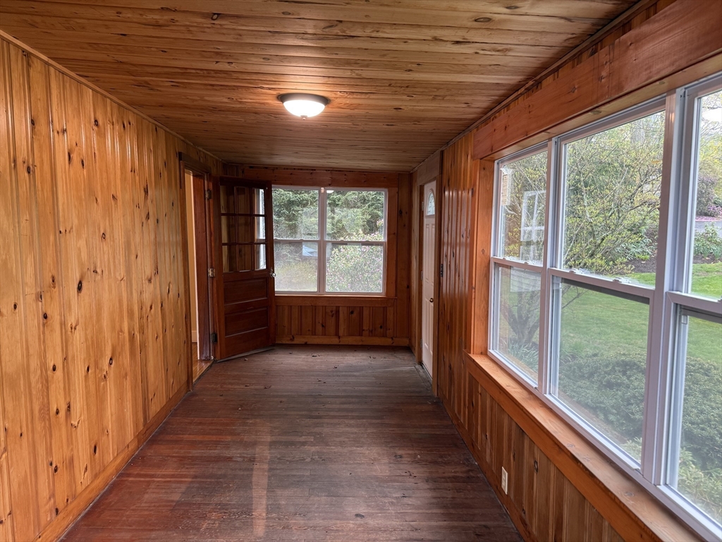 84 Emerald Road, Unit 1 Rutland, MA 01543 - Photo 13 of 22 a view of hallway with wooden stairs