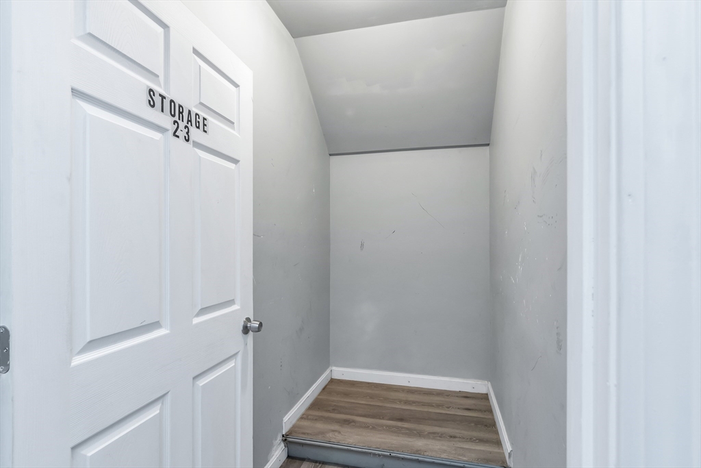 202 Broadway, Unit 23 Lawrence, MA 01840 - Photo 15 of 15 a view of a hallway