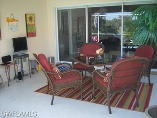 4648 Ossabaw Way Naples, FL 34119 - Photo 1 of 3 a outdoor living space with furniture